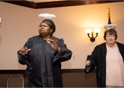 Anna Dotes women singing at the 2020 banquet